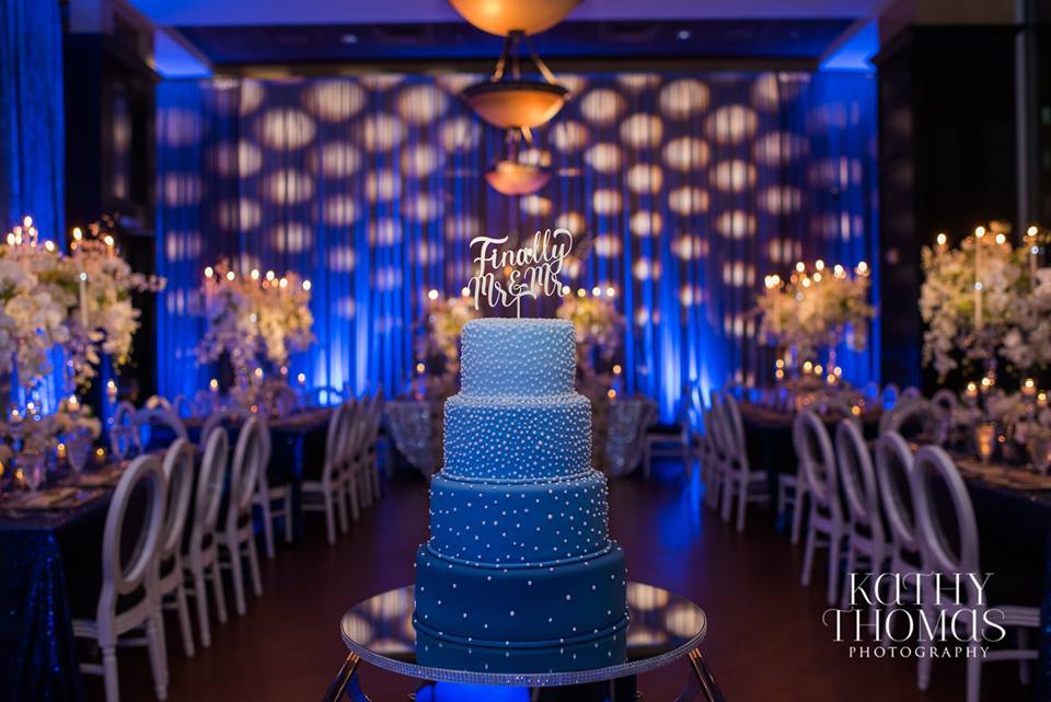 Cake in front of lighting display