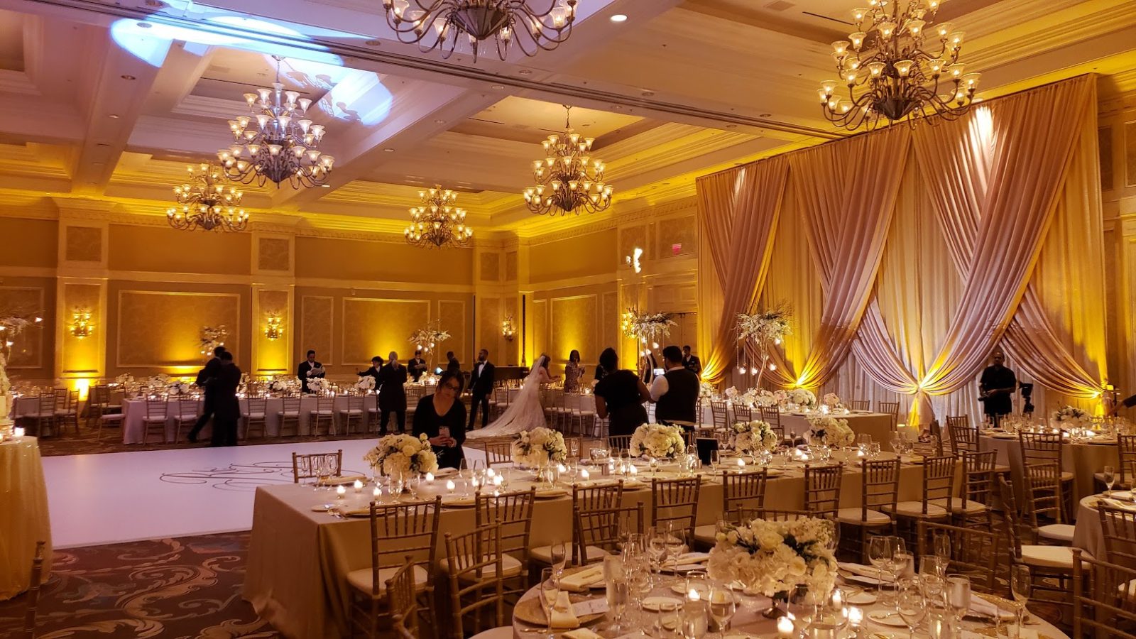 Warm banquet lighting Waldorf Astoria Grand Ballroom Amber Uplights