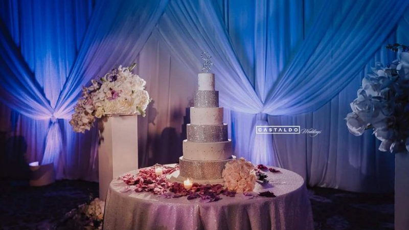 Wedding cake lit up with a cake spot light