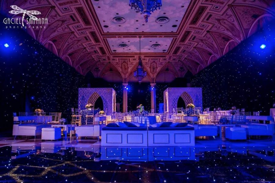 LED drapes lighting up a wedding venue