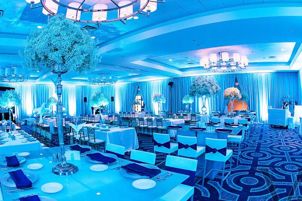 wedding reception hall with blue lighting